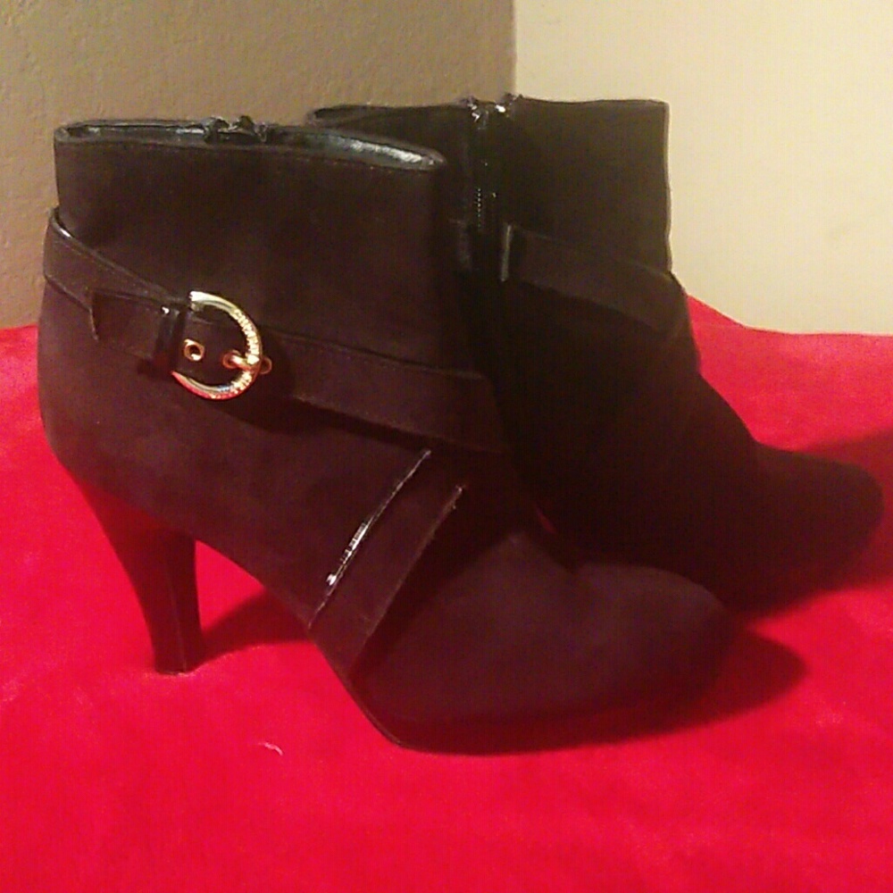 Pair of Cristia Siriano high heeled ankle boots